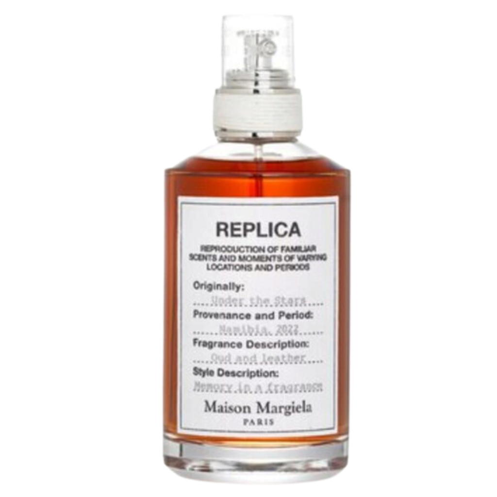 Replica Under The Stars EDT fragrance bottle with amber liquid and white label by Maison Margiela Paris