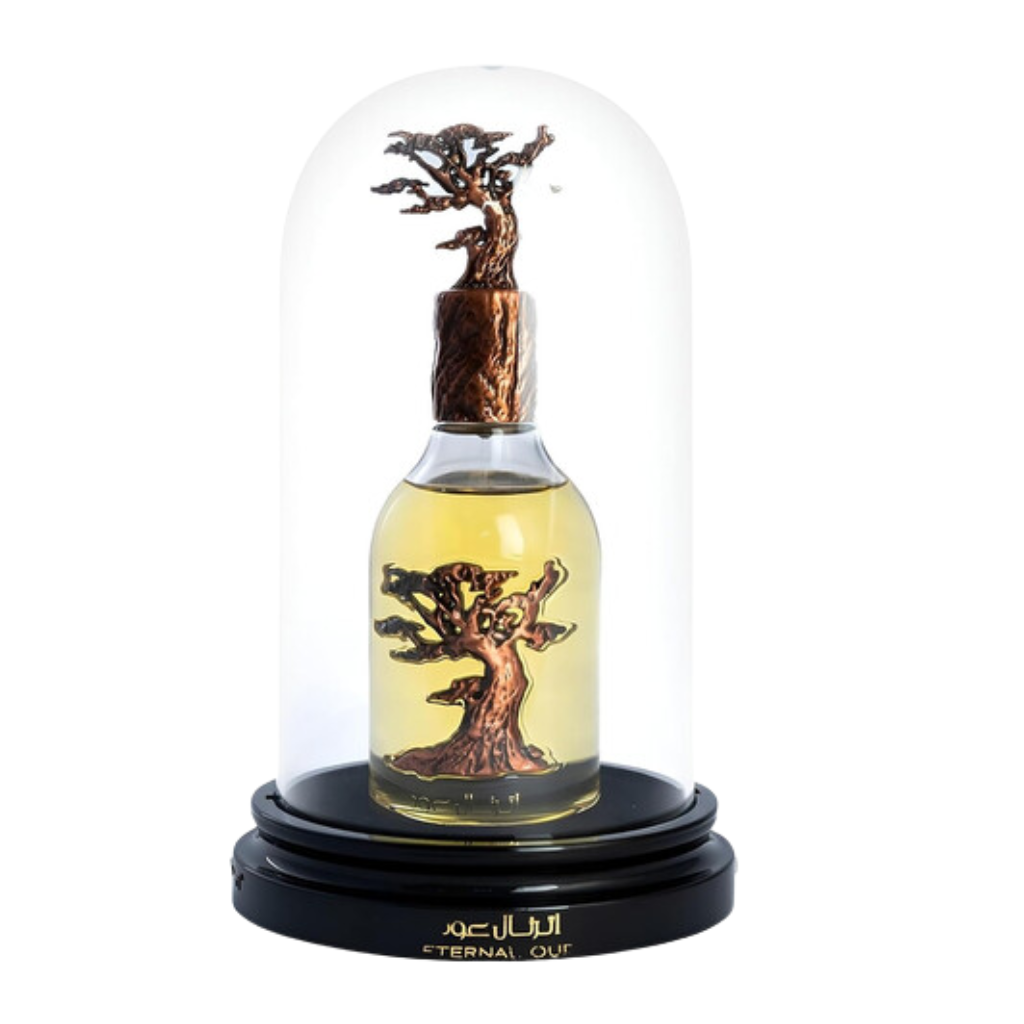 Pride Eternal Oud EDP perfume bottle with artistic tree design encased in a glass dome on black base display