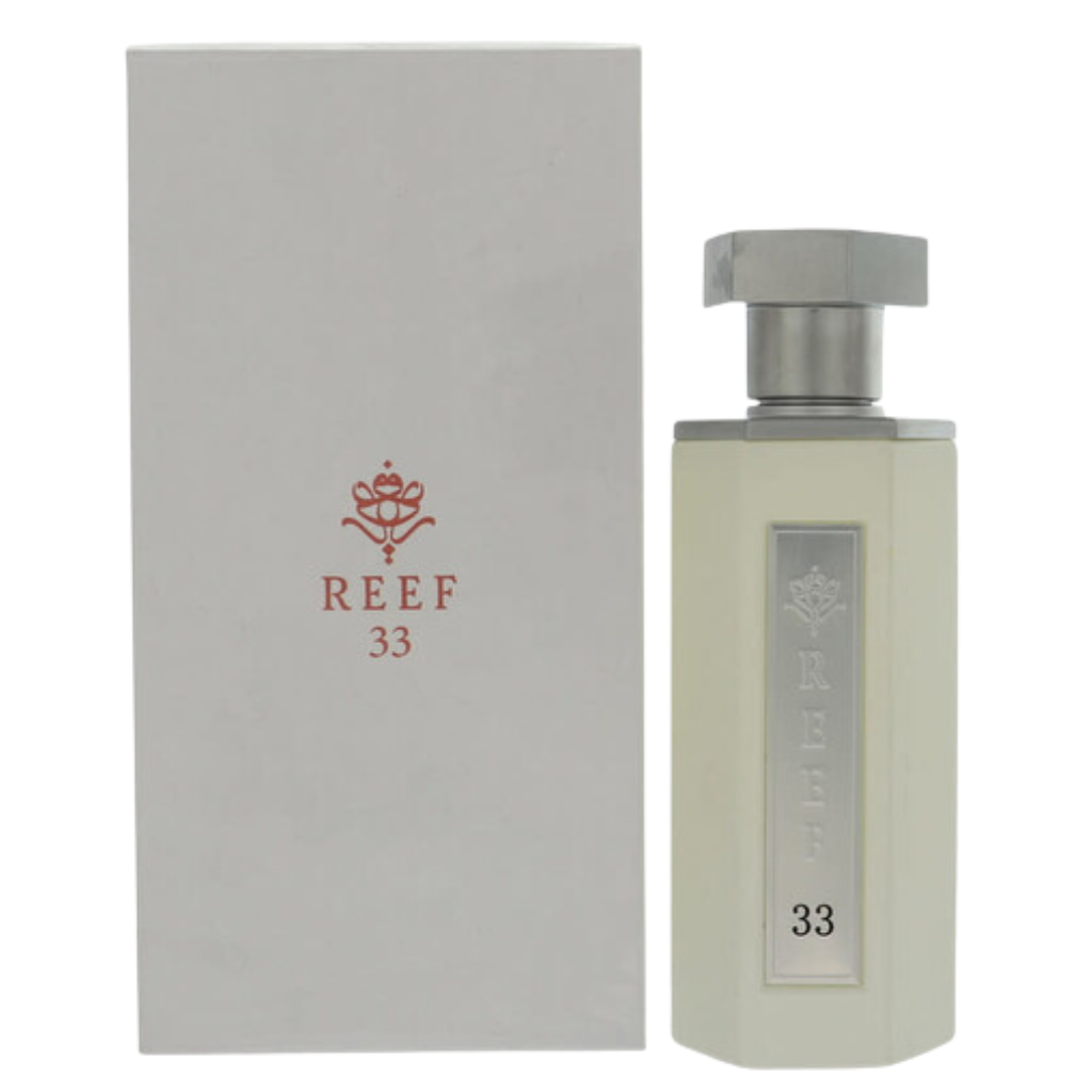 Reef 33 White EDP bottle with silver cap and matching white box featuring minimalist design and logo detail