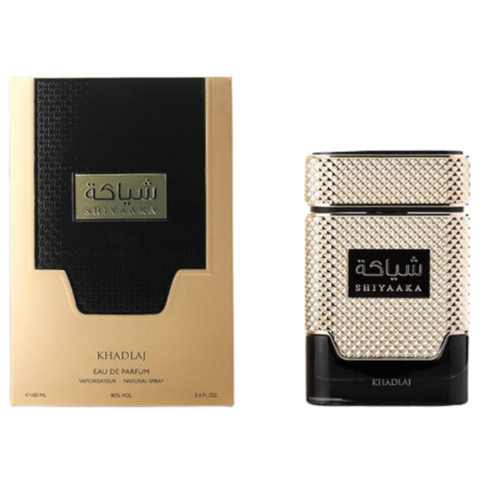 Shiyaaka Gold EDP perfume bottle and packaging with textured gold and black design showcasing luxury fragrance decants.