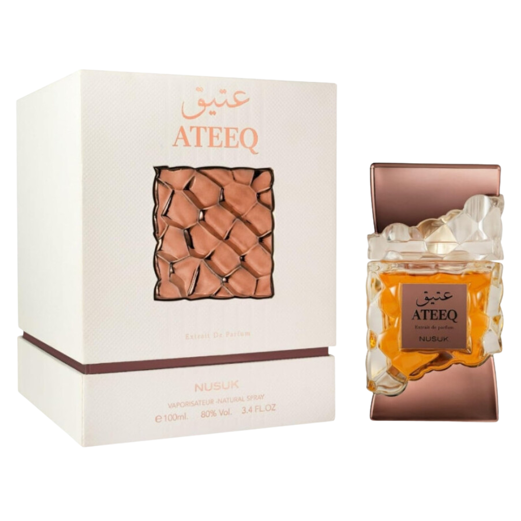 Ateeq Extrait de Parfum bottle and elegant box packaging featuring textured design and amber fragrance liquid inside