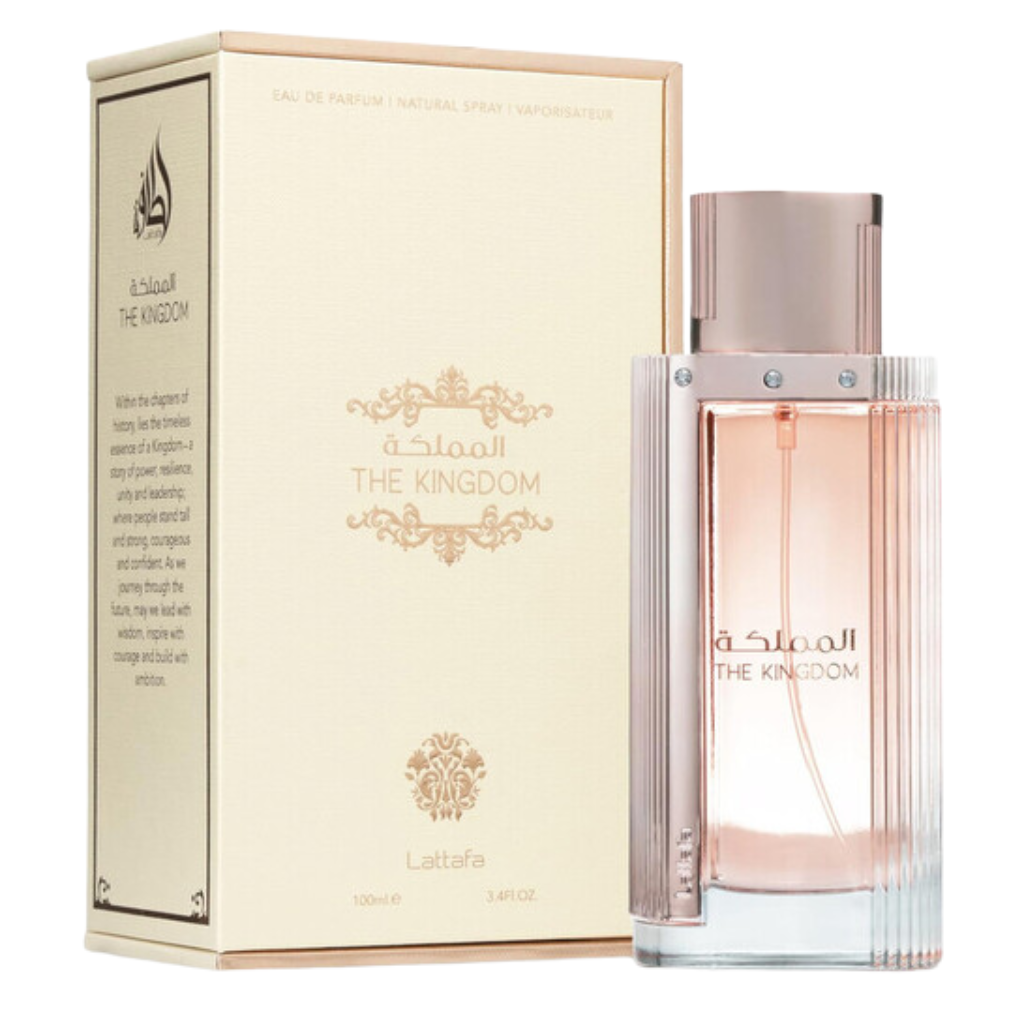 Elegant transparent bottle with soft pink liquid and matching cap beside beige box of The Kingdom for Women EDP fragrance