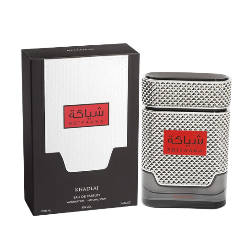 Shiyaaka Silver EDP perfume bottle with textured silver design and black cap next to its black and white box packaging