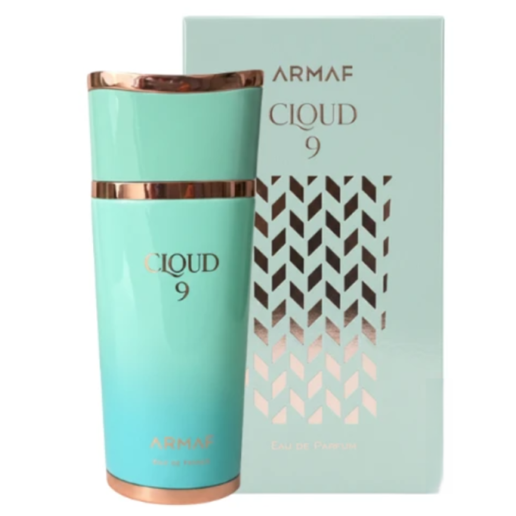 Cloud 9 EDP perfume bottle in turquoise and gold with matching box featuring geometric design and gold text