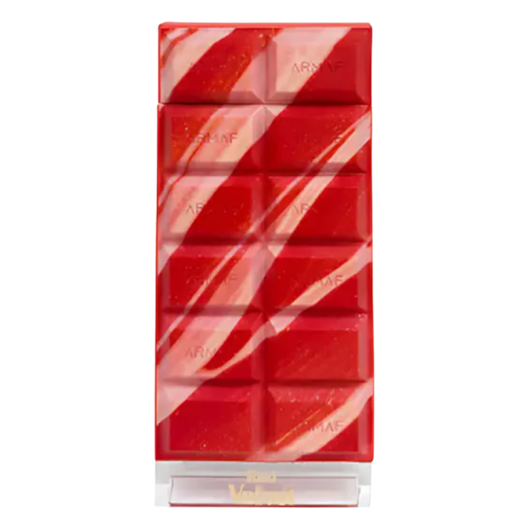 Delight Red Velvet EDP perfume decant in a red and pink swirled block design with a clear base container.