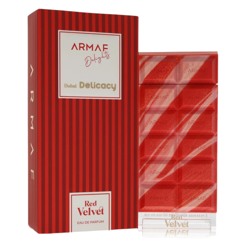 Red striped box and red perfume bar showcasing Delight Red Velvet EDP in sleek packaging with gold and white accents