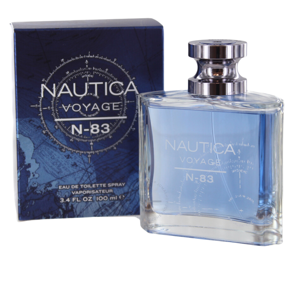 Transparent blue glass bottle of Voyage N-83 EDT next to a blue box with nautical compass design and text branding