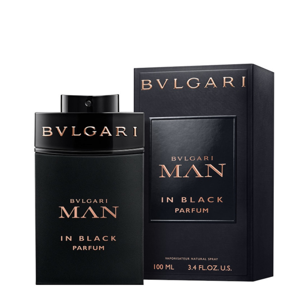Man In Black Parfum bottle and box in black with copper lettering, showcasing luxury fragrance packaging design.