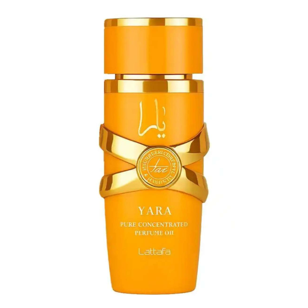 Yellow and gold bottle of Yara Tous Oil pure concentrated perfume oil by Lattafa isolated on white background