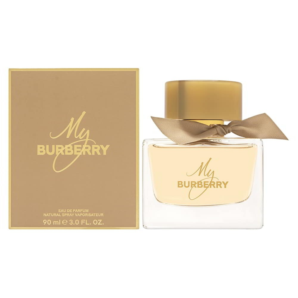 My Burberry EDP perfume bottle with beige cap and bow, next to matching beige and gold packaging box