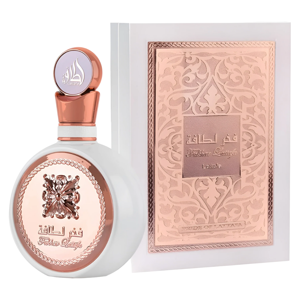 Elegant white and rose gold bottle with intricate design next to matching embossed box for Fakhar Women EDP fragrance