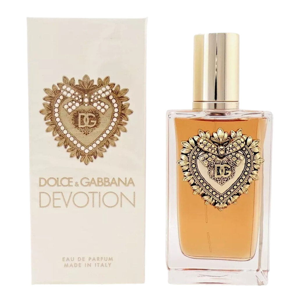 Devotion For Women EDP perfume bottle and box with gold heart emblem by Dolce & Gabbana displayed elegantly