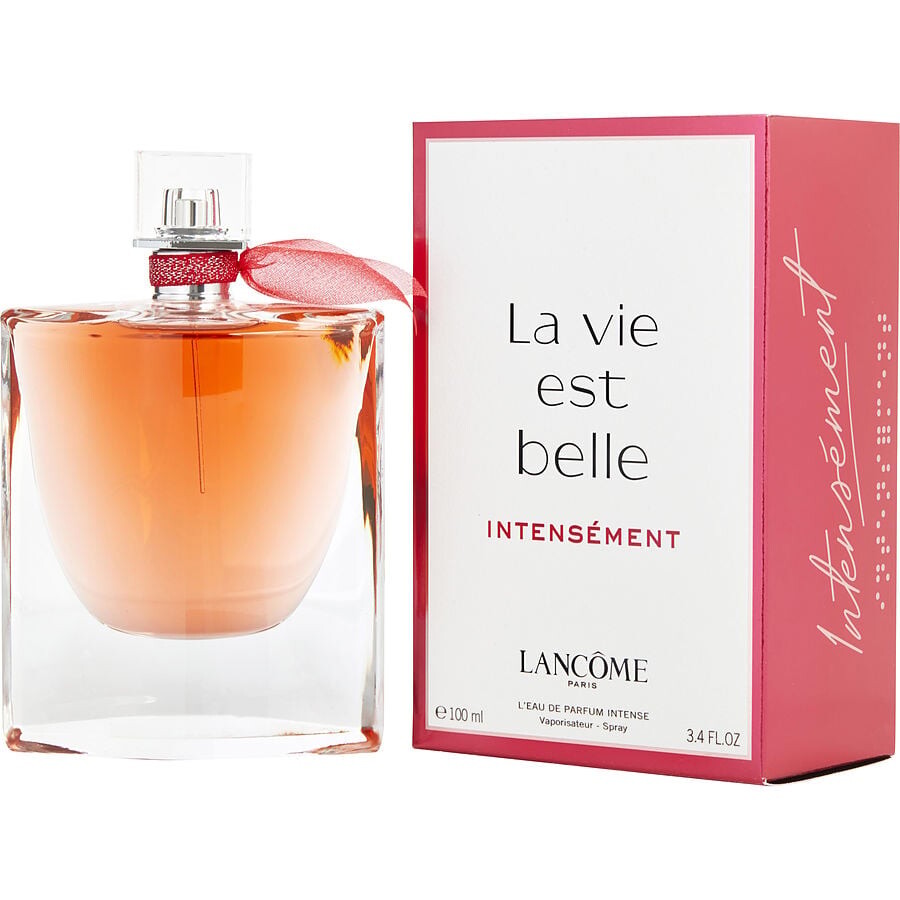 La Vie Est Belle Intensement EDP perfume bottle with amber liquid beside its white and pink packaging box