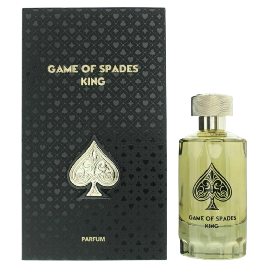 Game Of Spade King Parfum bottle with golden liquid beside black box adorned with spade symbols and gold text.