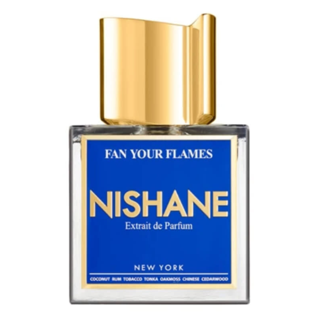 Bottle of Fan Your Flames Extrait de Parfum with gold cap and blue label featuring luxury fragrance branding